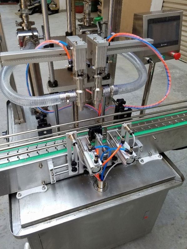 Otomatik 4 Kafalı Yüz Güzellik Kremi Dikey Kozmetik Macun Şişe Dolum Makinesi ve Besleme Pompası